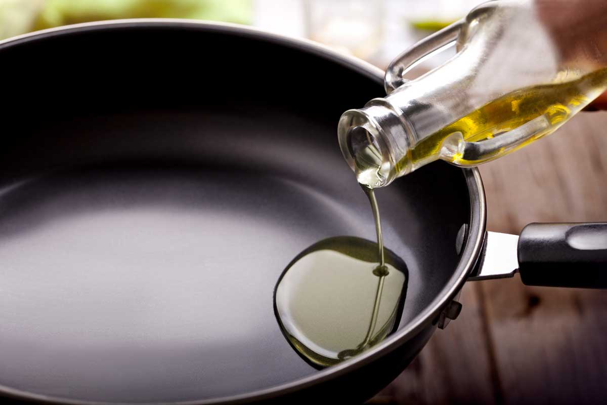 Olive oil poured on non-stick pan, Does Olive Oil Ruin Nonstick Pans?