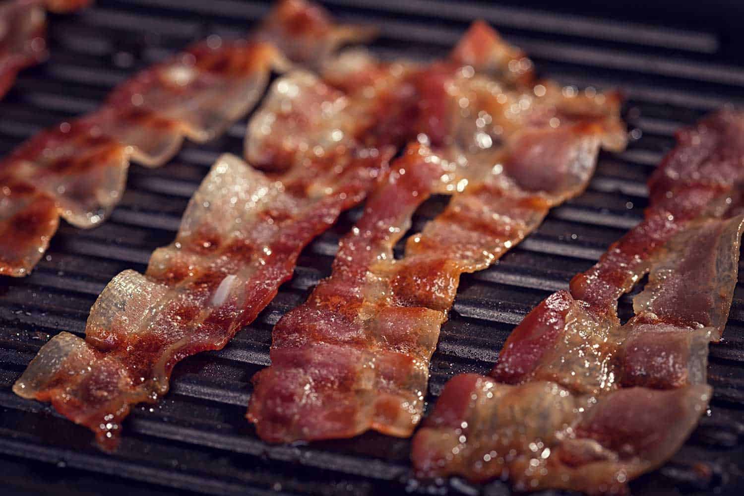 Delicious bacon grilled on a griddle
