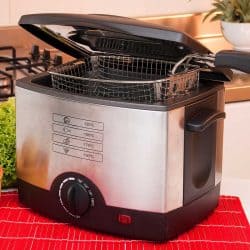 Electric frying pot with potatoes and lettuce in the kitchen, Top 10 Deep Fryers At Walmart