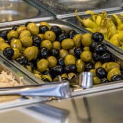 Green peppers, black olives, green olives and cabbage in a bain-marie at a cafeteria, How Long Can You Keep Food In A Bain-Marie?