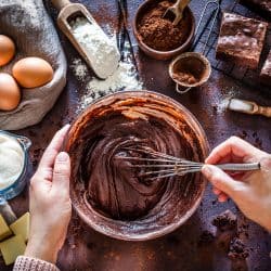 Woman mixing ingredients to make dark chocolate, How Many Mixing Bowls Do You Need?