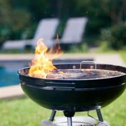 BBQ grill with flame burning at grill, 14 Luxury BBQ Gift Ideas For The Man Who Has It All
