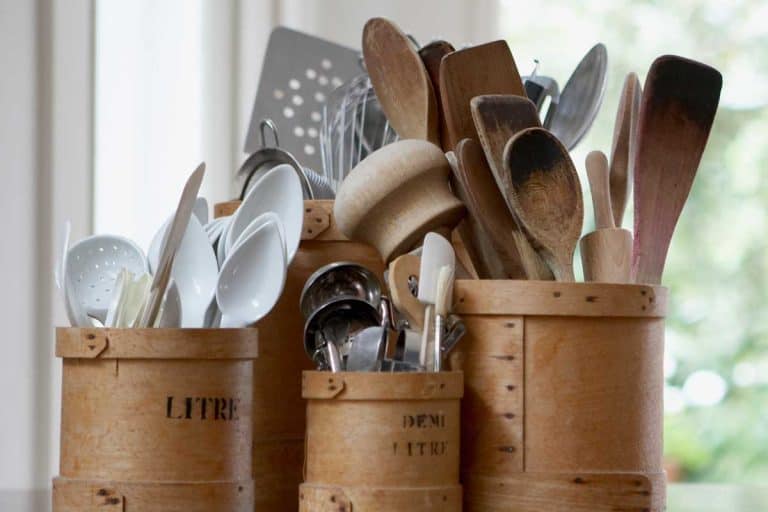 Kitchen utensils in containers on table, Kitchen Utensils: The Ultimate List [Do You Know All 56?]