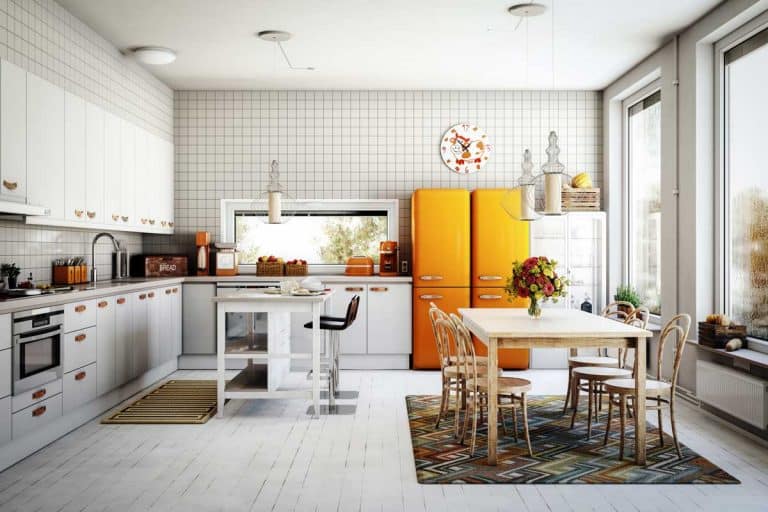 Scandinavian domestic kitchen interior scene with orange refrigerator, Where To Place A Refrigerator In A Kitchen [3 Crucial Considerations]