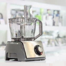 Silver food processor placed on white granite counter top, Kitchen Aid Food Processor Not Working - What Could Be Wrong?