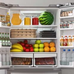 Open refrigerator full of food and drinks, How Do You Measure Refrigerator Liters?