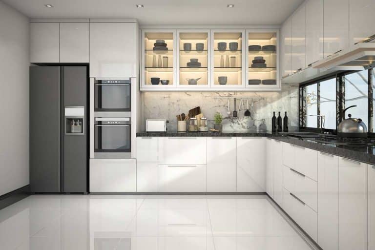 Beautiful modern white kitchen with tiled floor, Do You Tile Under Kitchen Cabinets?