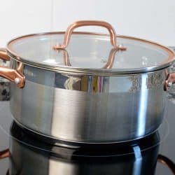 Cooking with stock pot over a glass ceramic kitchen, What’s the Best Material for Stock Pots? [Know before you buy!]