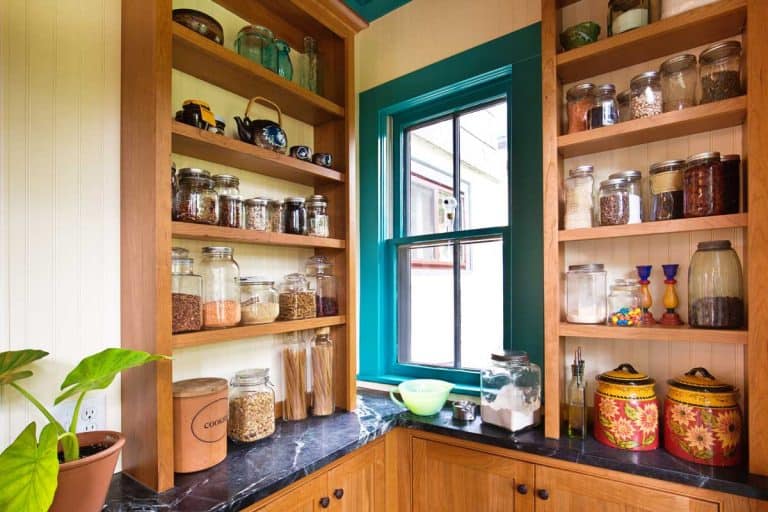 A contemporary classic kitchen renovation remodeling featuring a pantry storage shelf and maple cabinet, What is the Standard Size of a Pantry? [By Pantry Type]