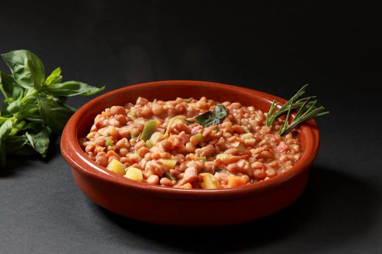 Chickpeas with beef, ham, and vegetable dish on a casserole dish, Can A Casserole Dish Be Used For Serving?
