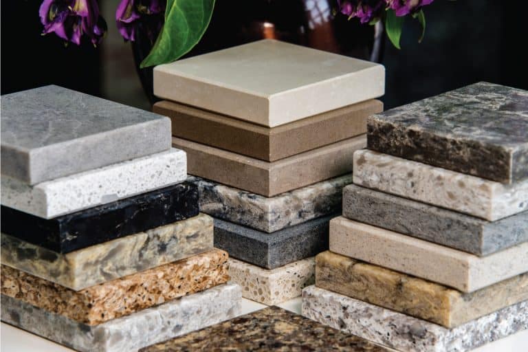 Assorted samples of granite countertops, How Much Does it Cost to Replace Granite Countertops?