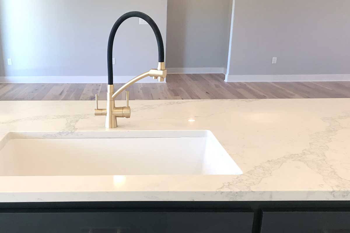 part of a kitchen island with quartzite countertop