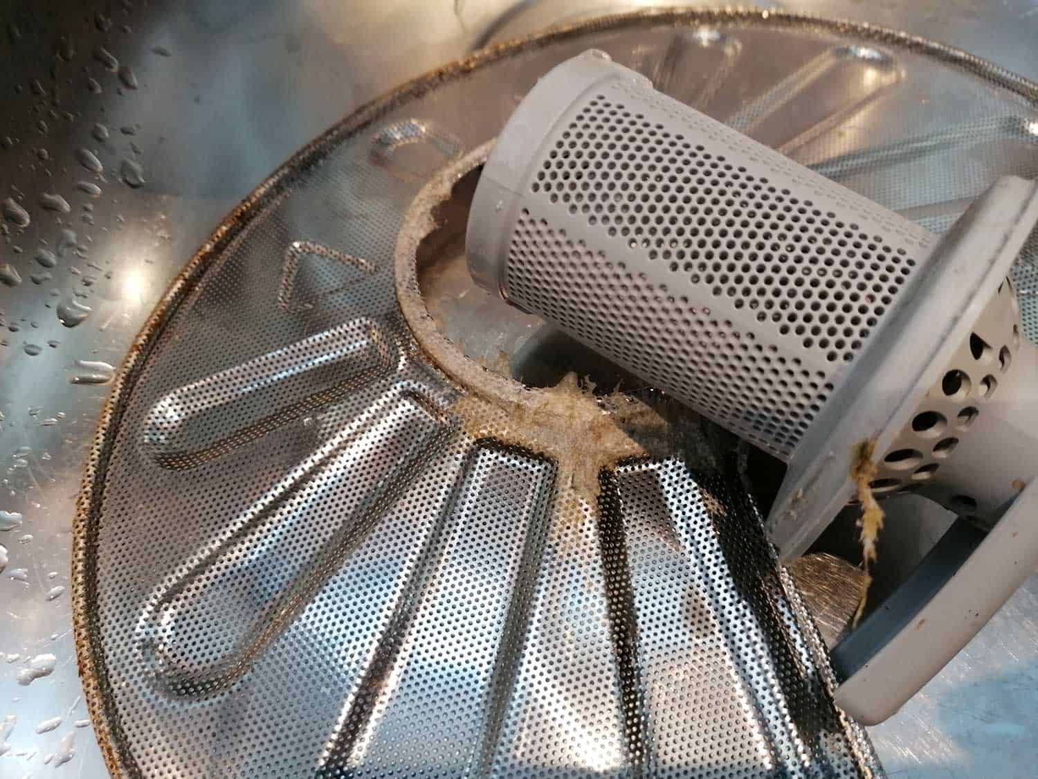 A dishwasher filter with dirt