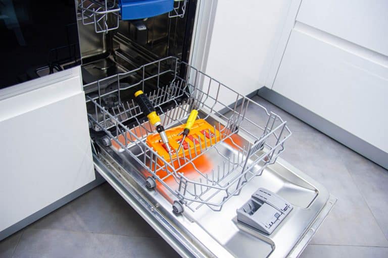 An opened dishwasher due to a broken dryer, Bosch Dishwasher Not Drying? Here's What To Do