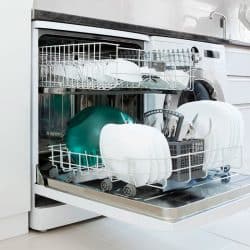 An opened dishwasher with dishes and other kitchen utensils inside it, How Wide Is A Standard Dishwasher?
