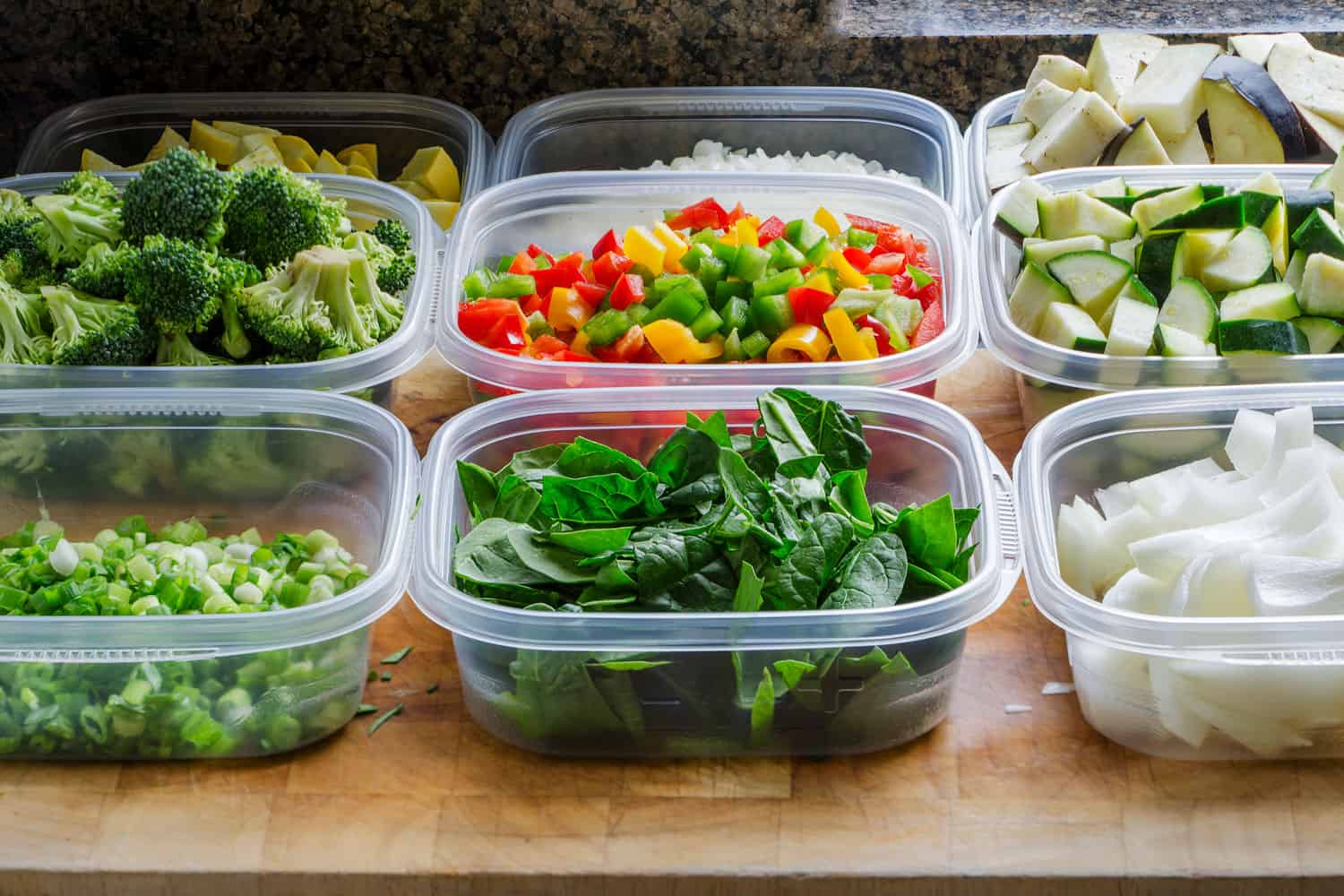 Chopped vegetables in plastic containers
