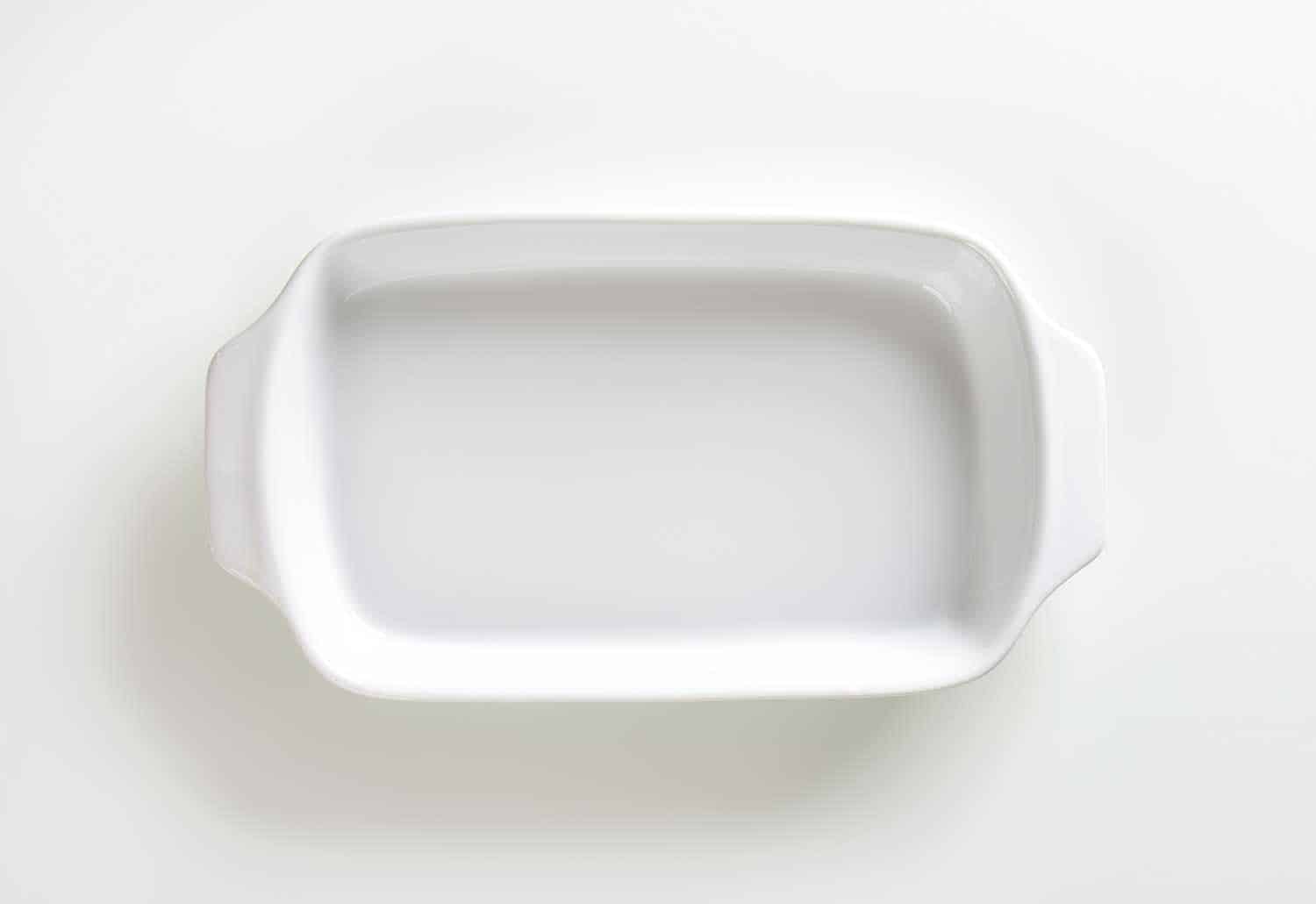 Classic white ceramic baking dish with handles