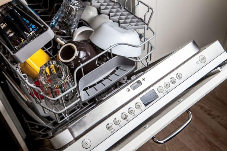 Clean dishes in dishwasher machine after washing cycle, How Long Does A Dishwasher Run?