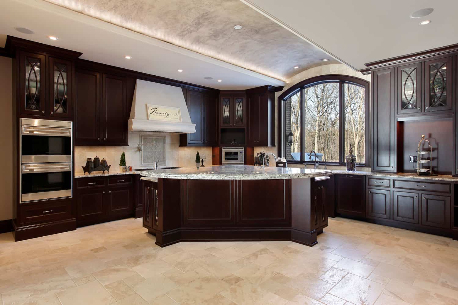 Large kitchen in luxury home with kitchen island