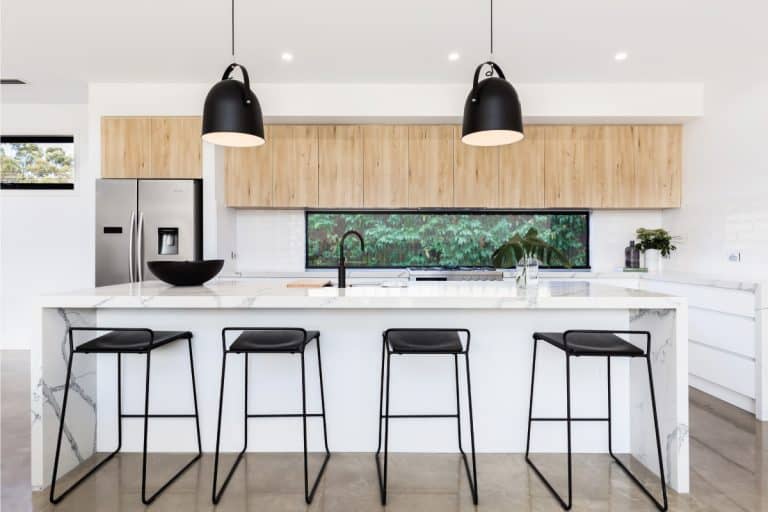 Large white luxury Australian kitchen with marble waterfall island, Where To Put Outlets In A Waterfall Island