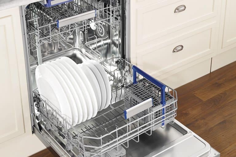 clean dishes in an open dishwasher in domestic kitchen, What's the Typical Dishwasher Height? (Inc. ADA Dishwashers)