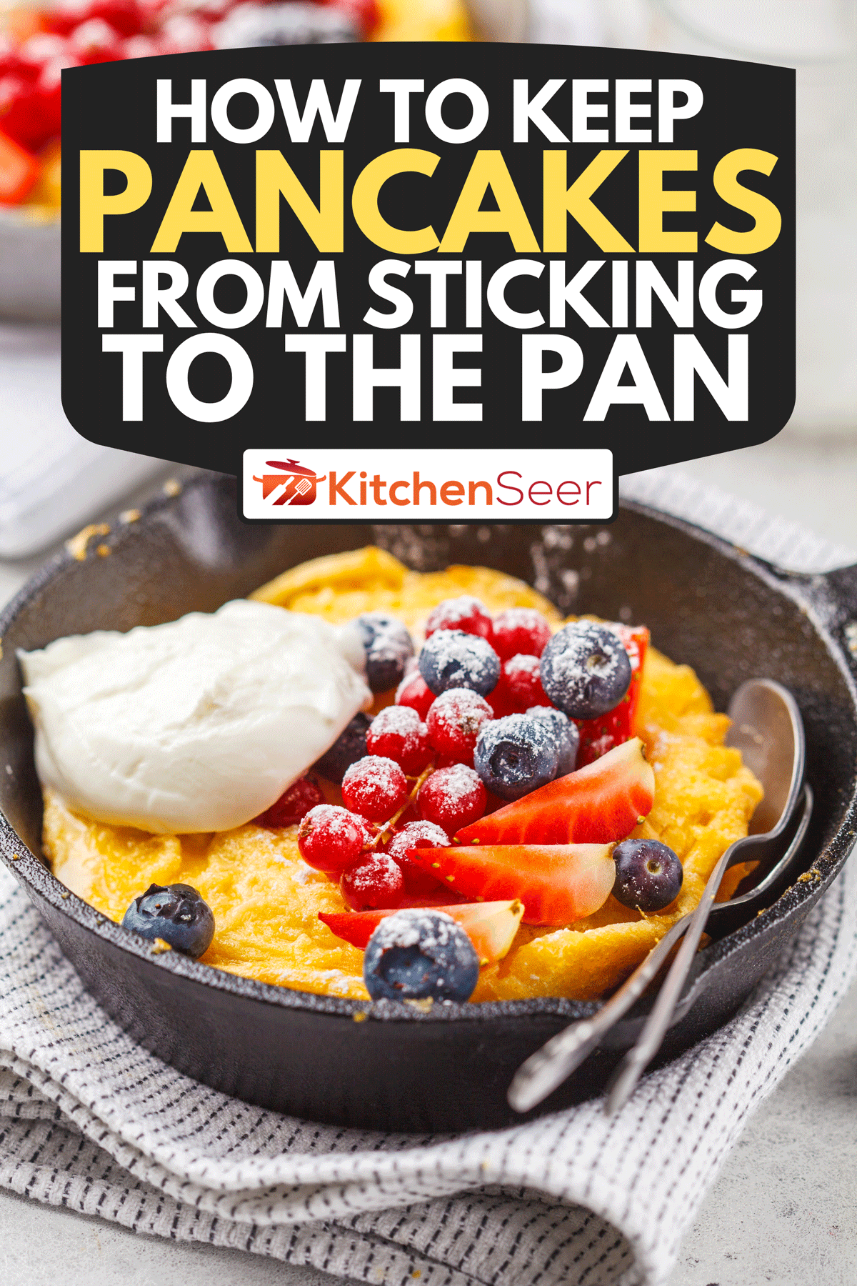 Dutch baby pancake with berries in a cast-iron pan, How To Keep Pancakes From Sticking To The Pan