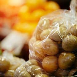 Lots of potatoes wrapped inside a plastic container, Should You Take Potatoes Out Of The Plastic Bag?, Should You Take Potatoes Out Of The Plastic Bag?