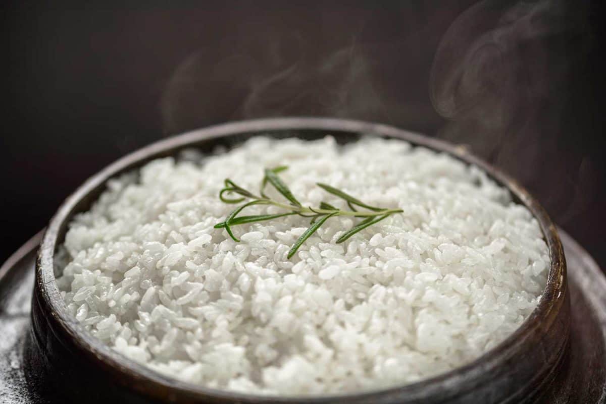 Steamed white rice cooked in cast iron pot