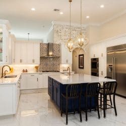 Beautiful luxury estate home kitchen with white cabinets, What Color Light Is Best For The Kitchen?