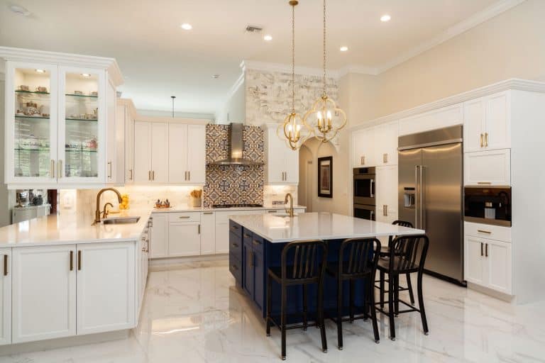 Beautiful luxury estate home kitchen with white cabinets, What Color Light Is Best For The Kitchen?