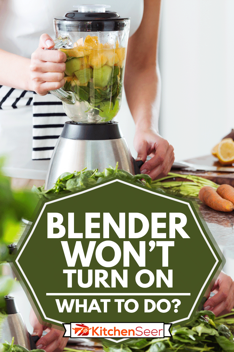 Vegetarian preparing vegan smoothie with rucola, citrus, cucumber in kitchen with carrots on countertop, Blender Won't Turn On - What To Do?