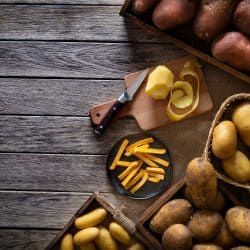 Different varieties placed on baskets on top of a table, Should You Keep Potatoes In The Fridge?