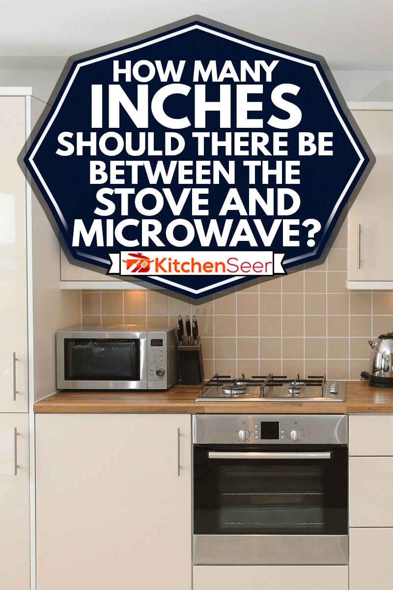 Modern kitchen interior with inegrated appliances and ceramic tiled walls and floor, How Many Inches Should There Be Between The Stove And Microwave?