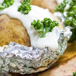 fresh baked potatoes with sour cream wrapped in foil, Should You Bake Potatoes In Foil?  