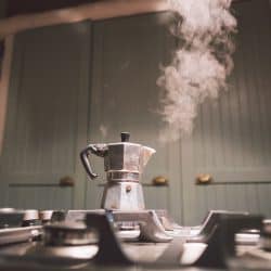 A steaming percolator on a kitchen stove, How To Use A Stovetop Percolator [8 Easy To Follow Steps!]