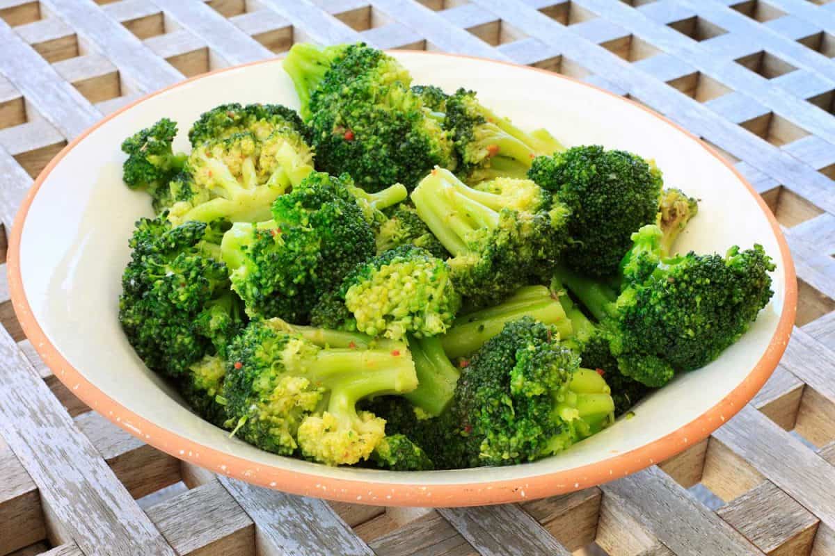 Broccoli salad on a plate on wooden table