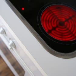 Detailed hotplate on top of a stove, What Are The Best Hot Plates For Boiling Water? [7 Options Explored]