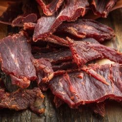 An up close and detailed photo of a beef jerky placed on a table, How To Make Beef Jerky In Convection Oven [7 Easy-To-Follow Steps!]