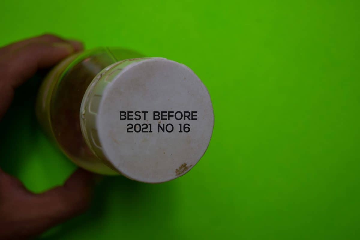 Close up text Best Before Date on Bottle Cap Food