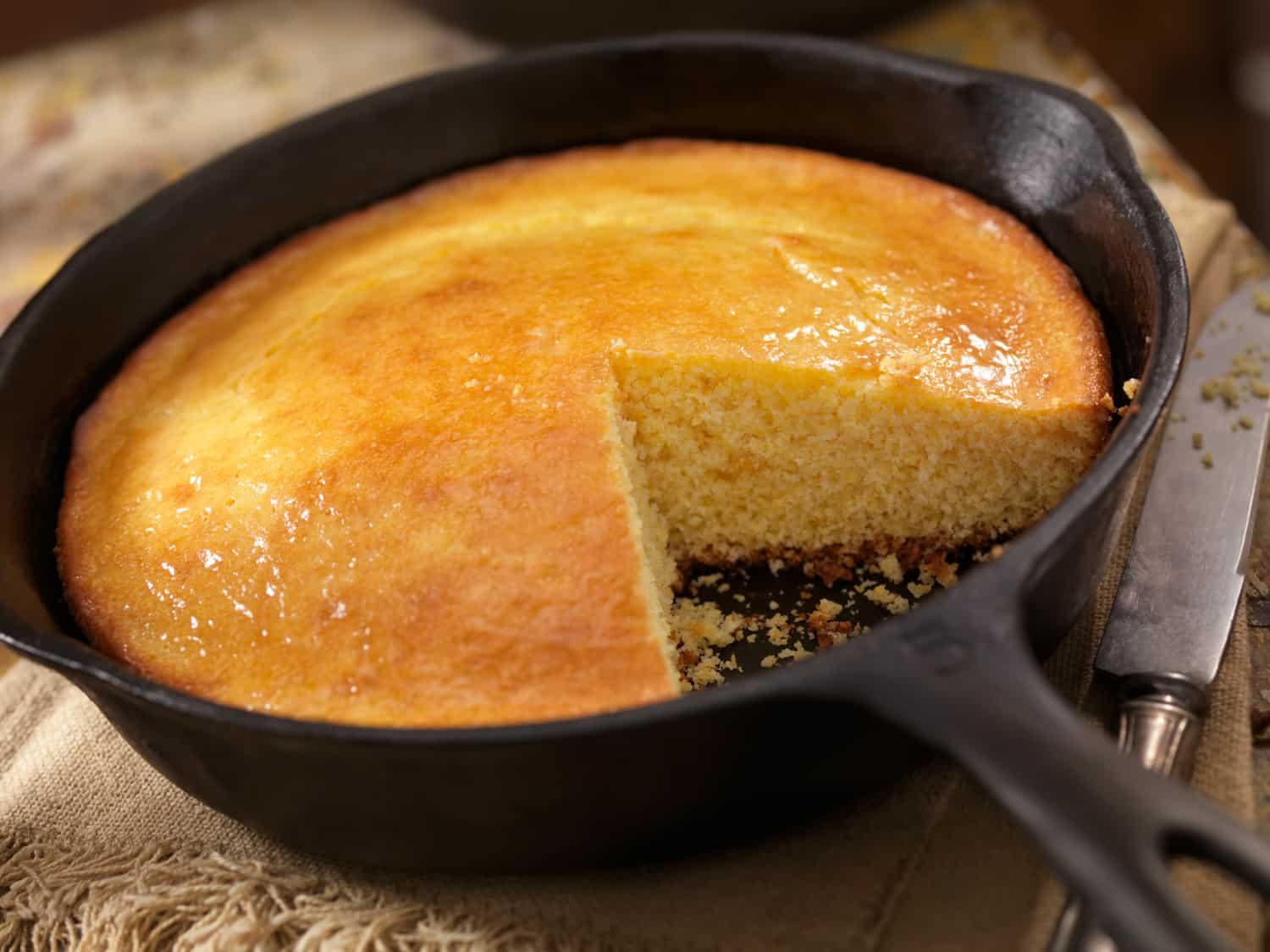 Corn Bread in a Cast Iron Skillet with a Pot of Baked Beans-Photographed on Hasselblad H3D2-39mb Camera
