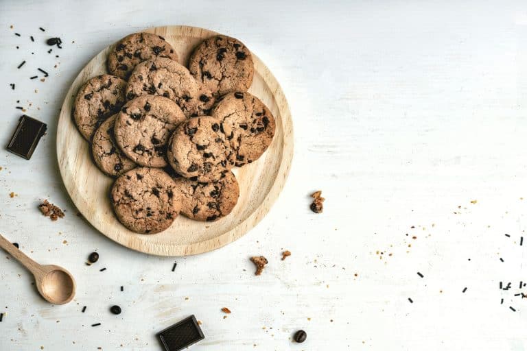 Can You Make Cookies Without Butter?,Plate of artisan cookies with chocolate chips on a white background