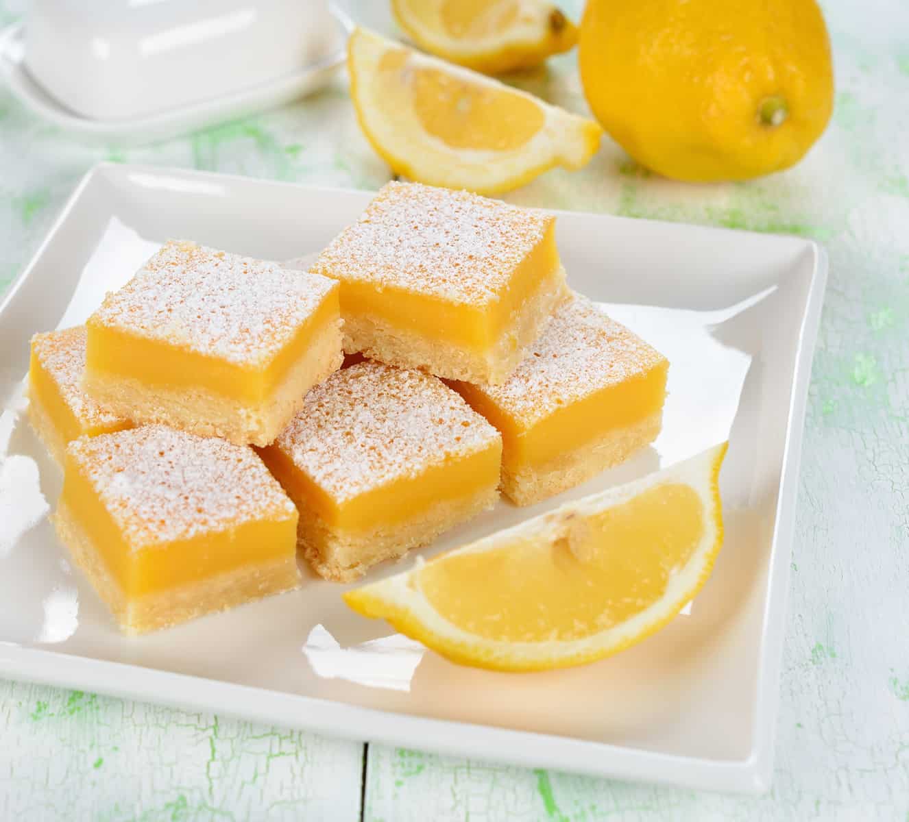 Traditional lemon bars on a white table