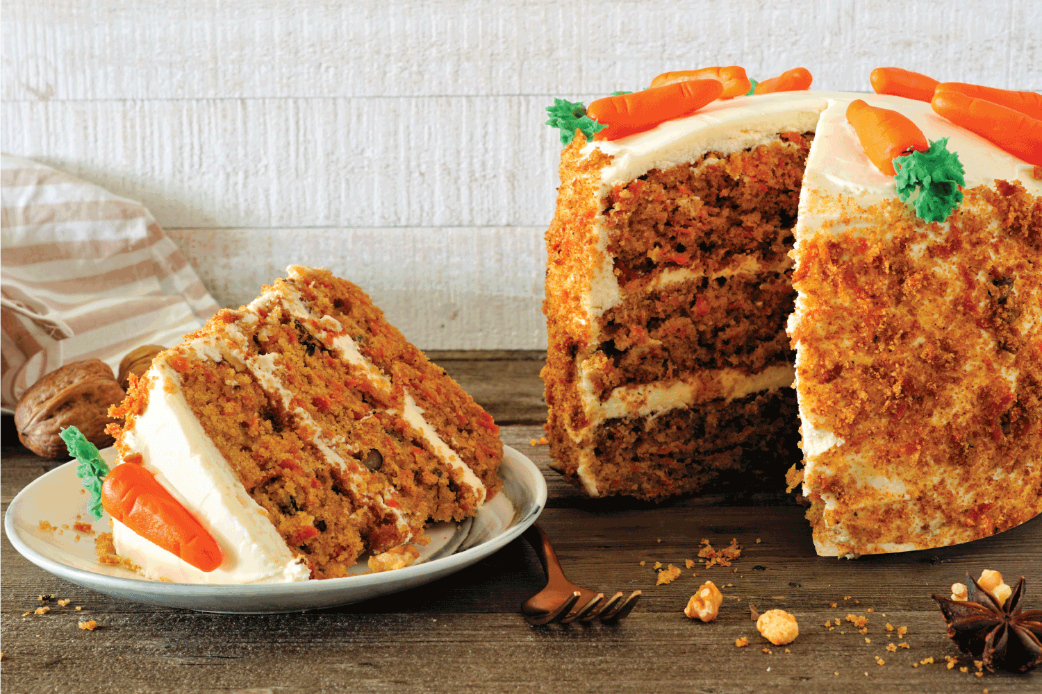 homemade carrot cake with cream cheese frosting and fondant carrots