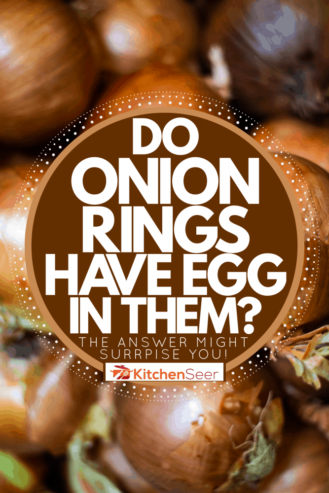 Fresh harvested white onions freshly piled, Do Onion Rings Have Egg In Them? [The Answer Might Surprise You!]