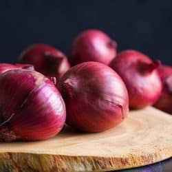 Red onions on wood board, Can You Cook With Red Onions?