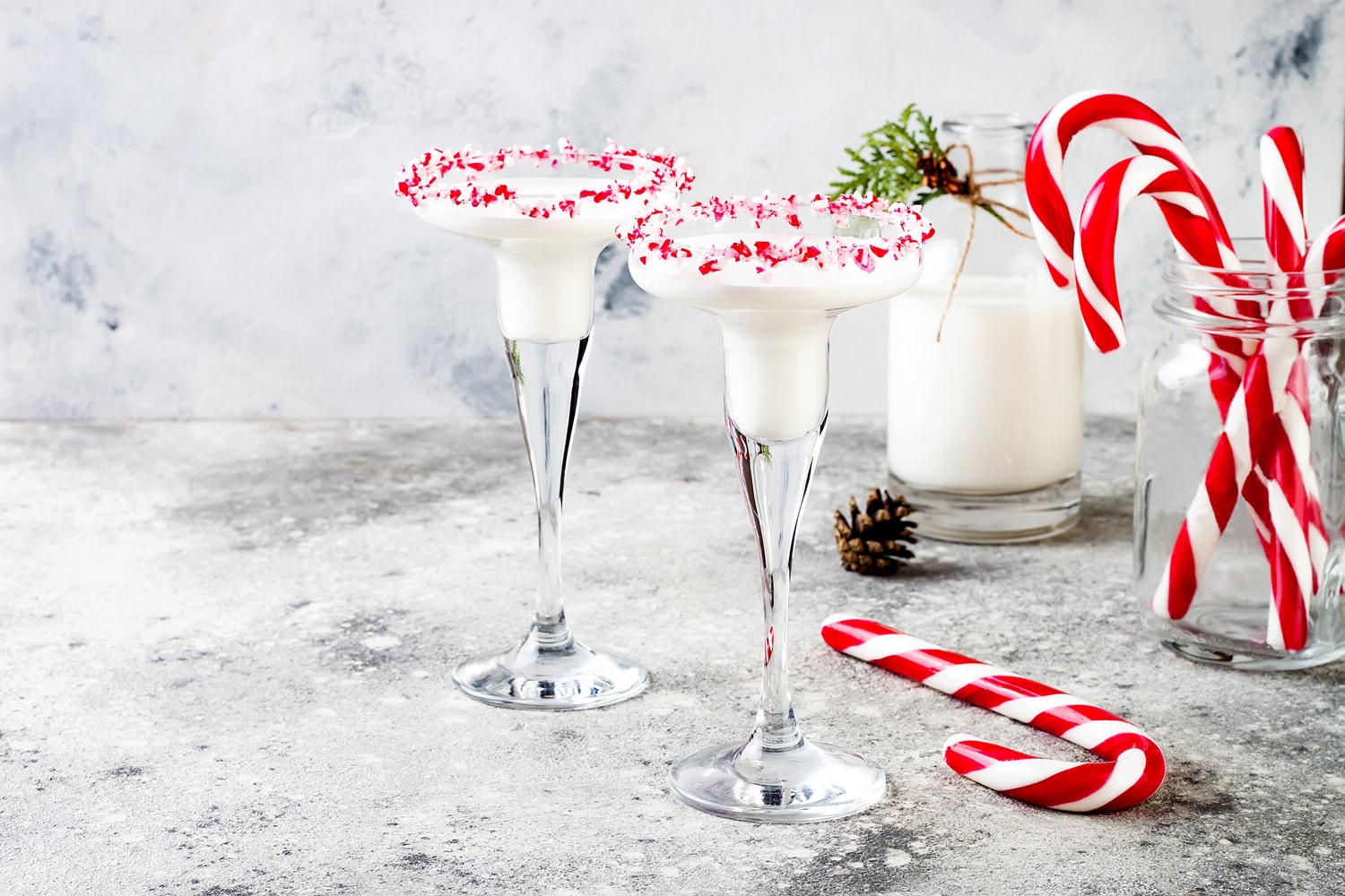 White chocolate peppermint martini with candy cane rim
