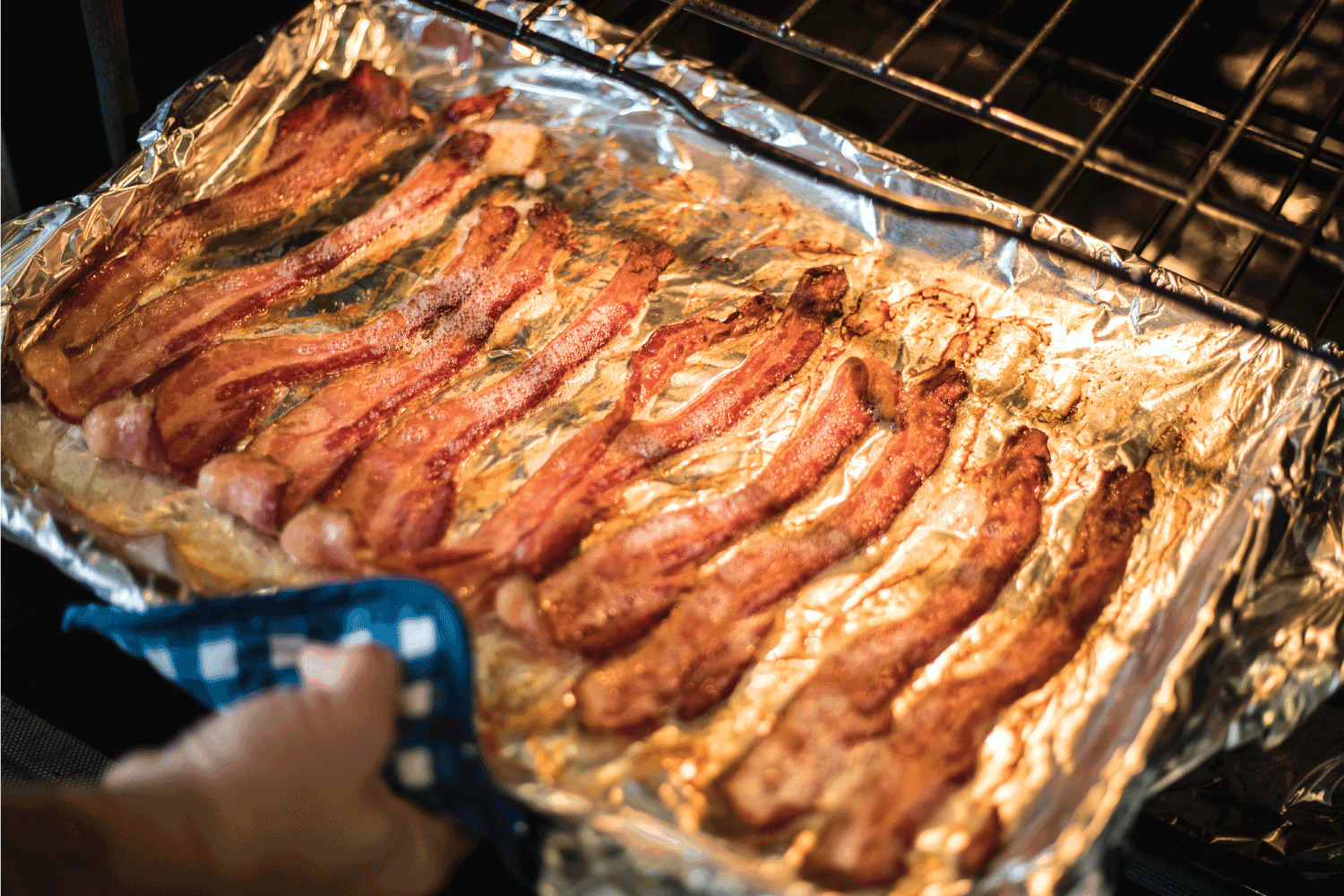 some Bacon cooking in an oven