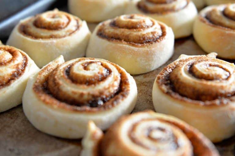 A tray of cinnamon buns fresh from the oven, Do Cinnamon Rolls Need To Be Refrigerated?