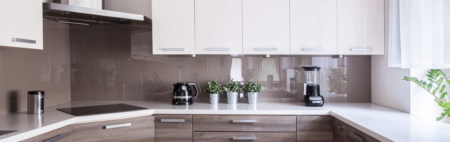 Beige and white kitchen design with blender