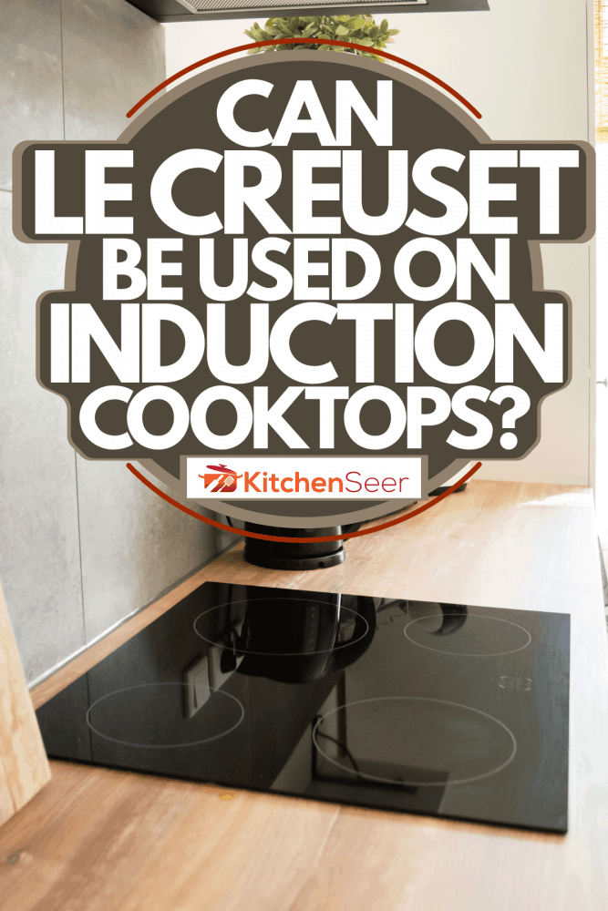 A minimalist and modern inspired kitchen with a black induction cooktop, Can Le Creuset Be Used On Induction Cooktops?
